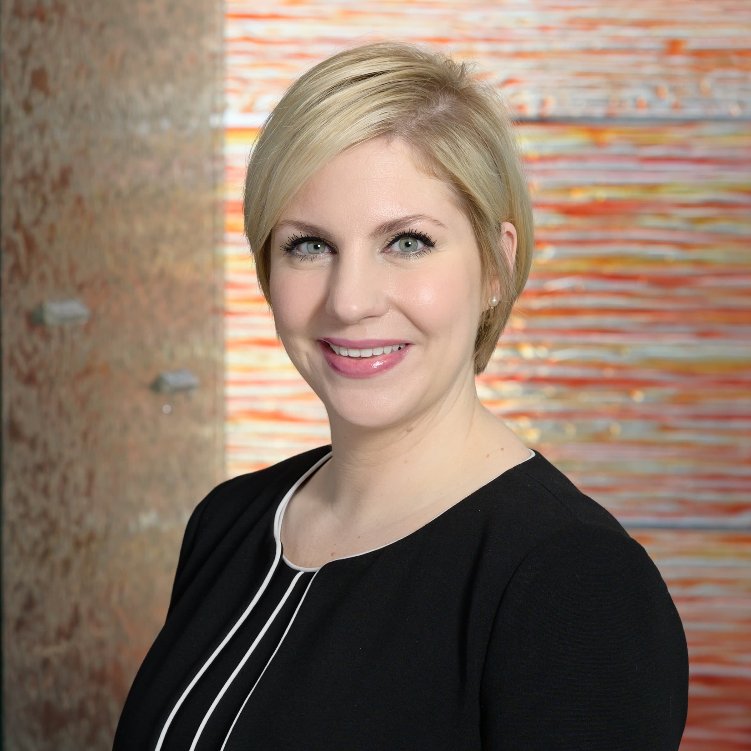 Ashley R. Genser